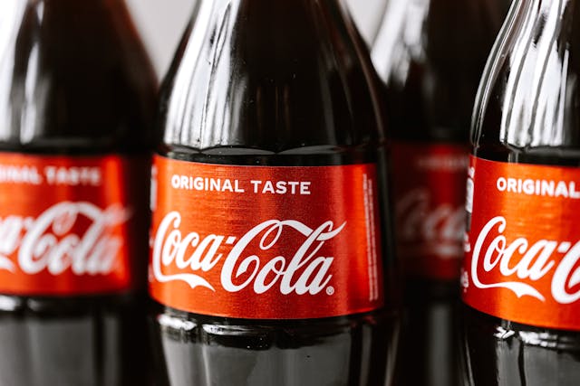 photo of coca-cola bottles