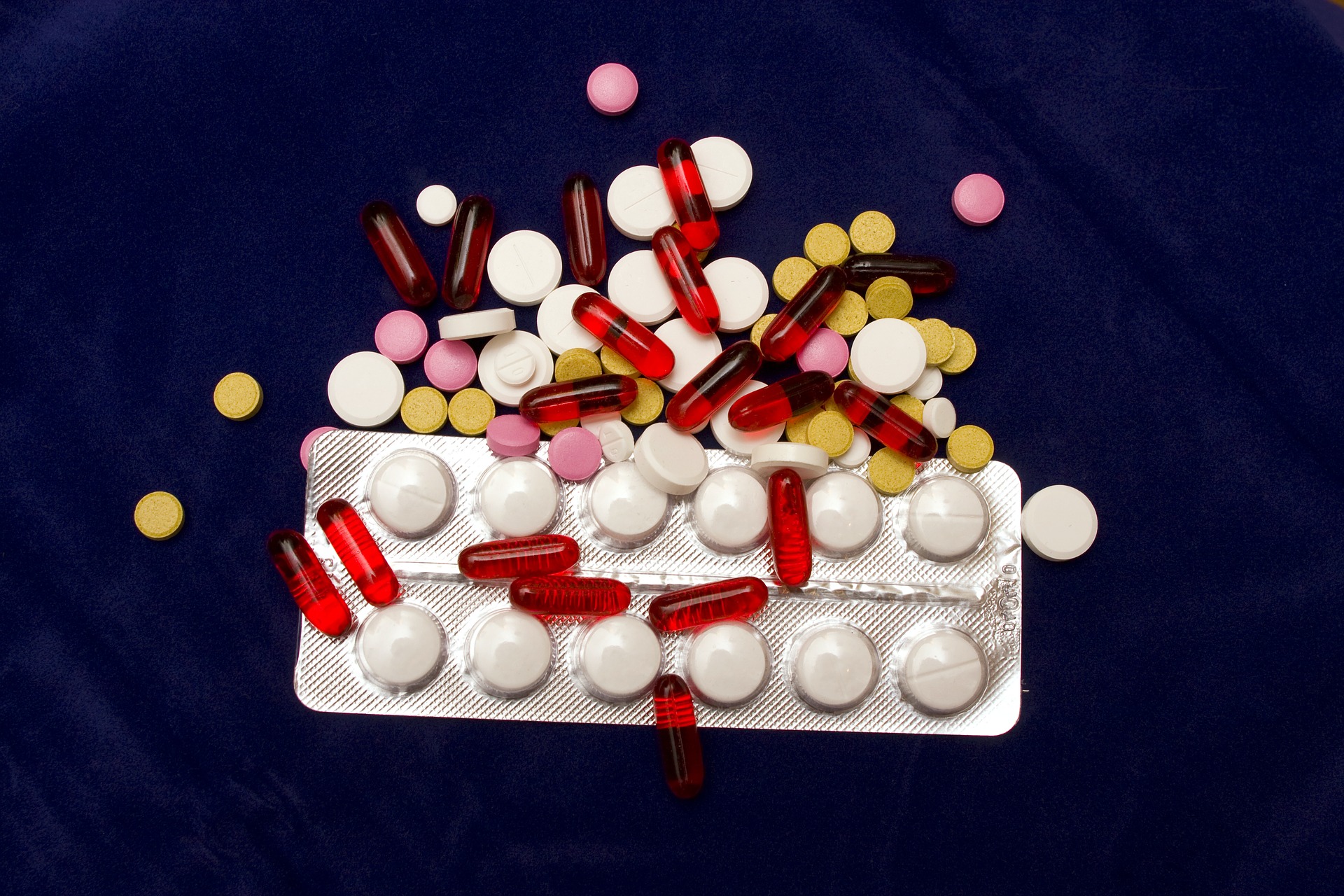 A variety of pills and medications seen among plastic and foil blister packs that may contain microplastics