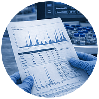 Person wearing blue gloves holding a scientific report with charts and graphs in a lab setting with test tubes in the background.
