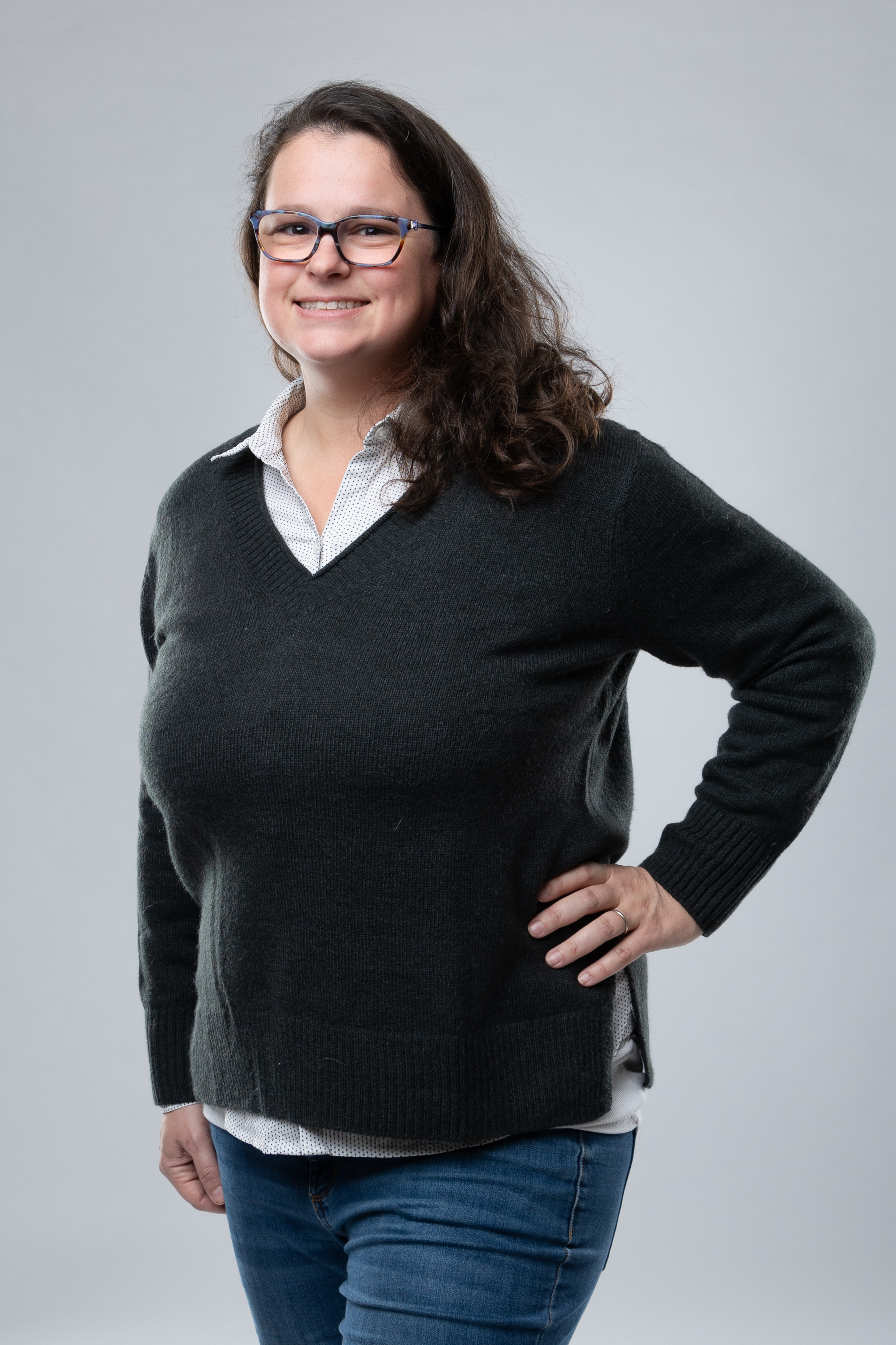 a diverse group planting trees together