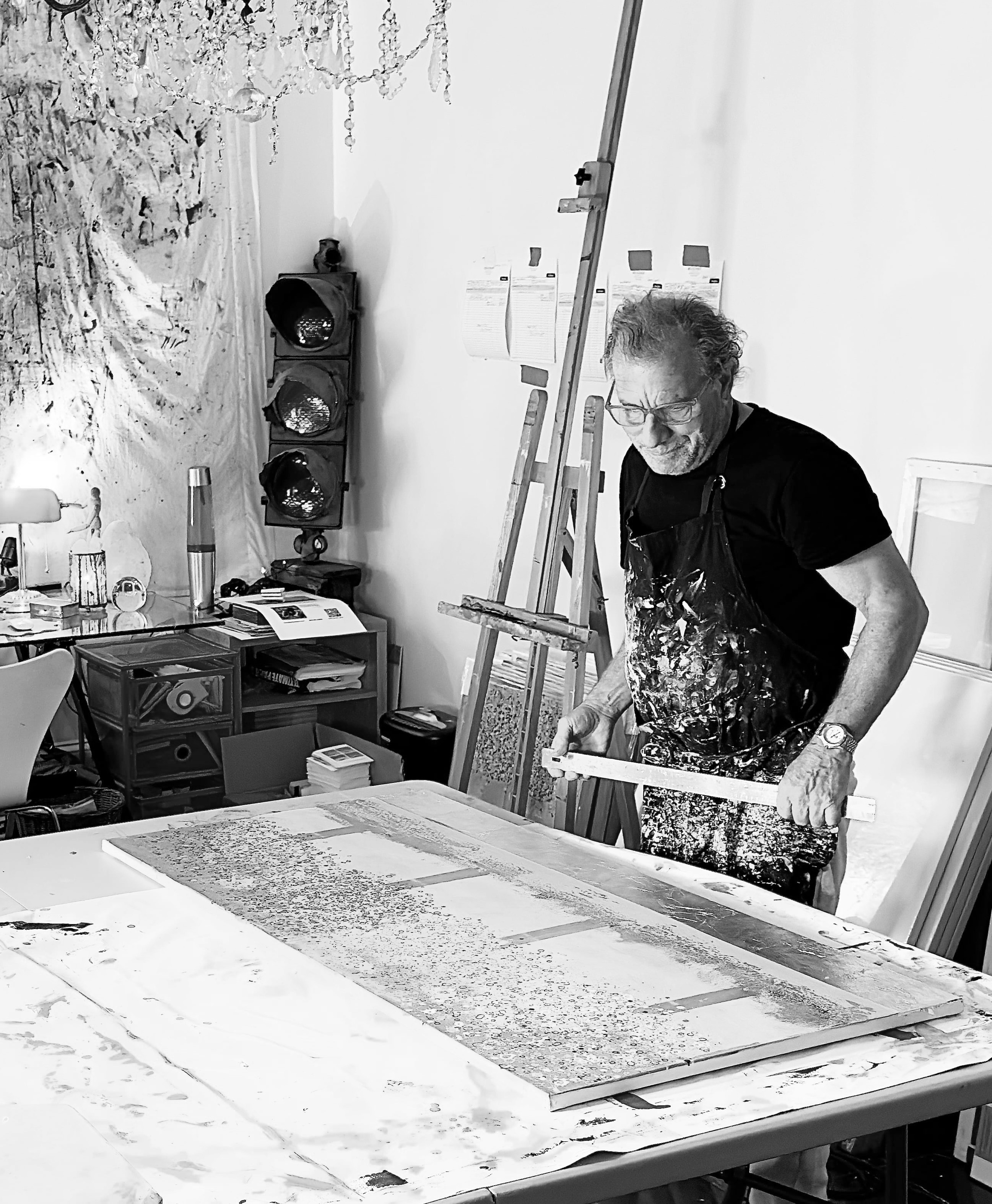 Ben painting in his studio