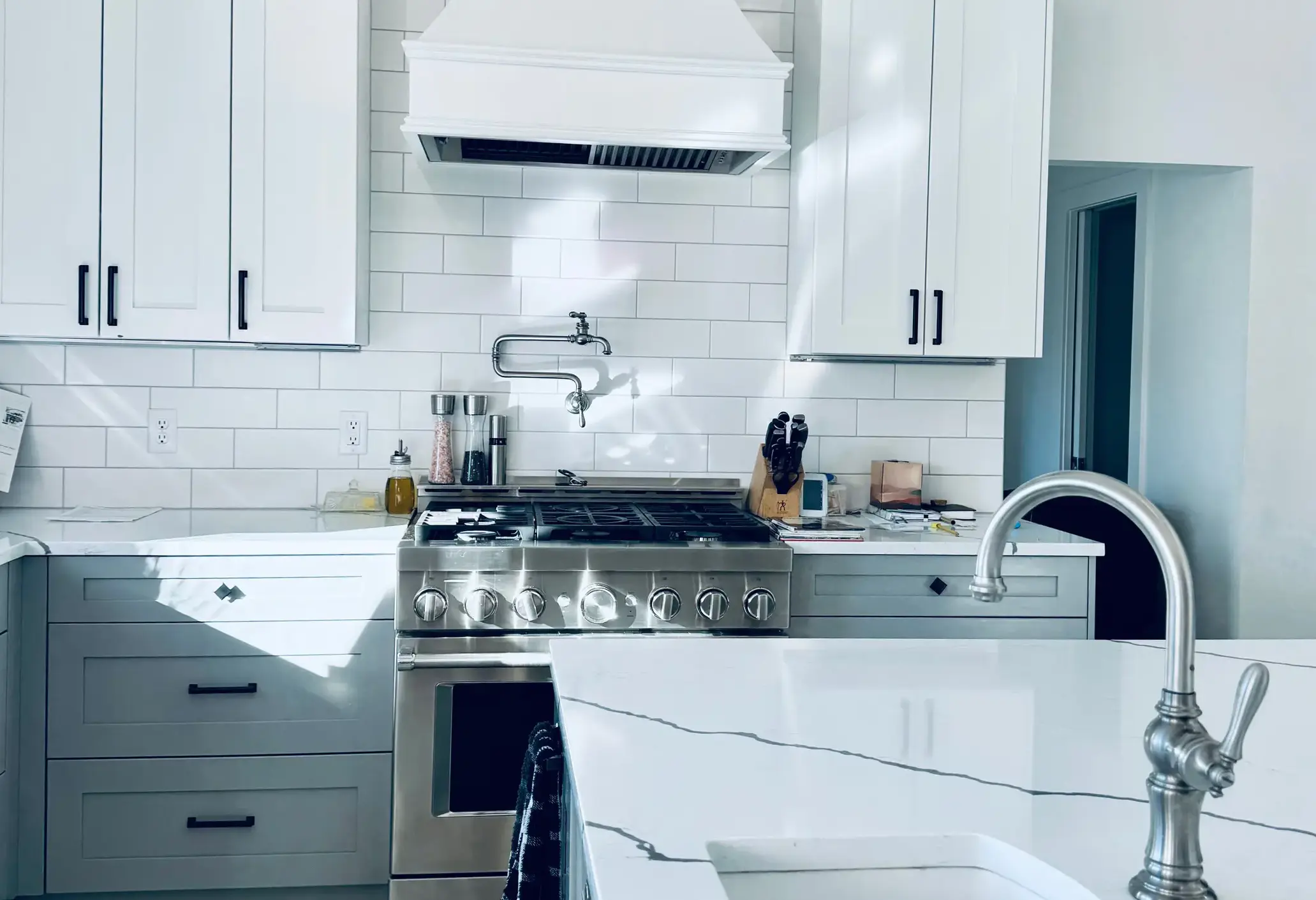 Interior painting with white kitchen cabinets and clean modern interior finish