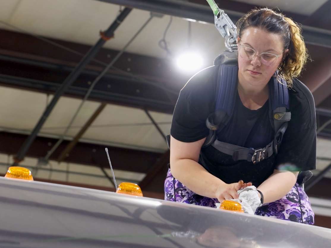 Cornerstone technician applying final details to the running lights