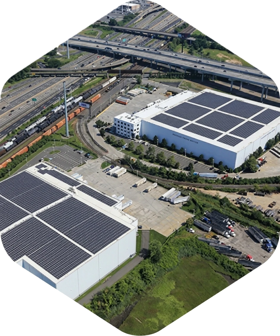 Aerial view of solar panels installed on a commercial building.