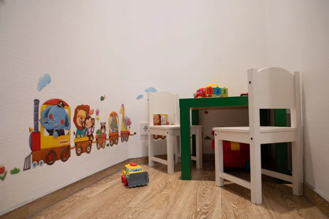 Kinderbereich der Praxis am Bertrandishof mit Spielecke