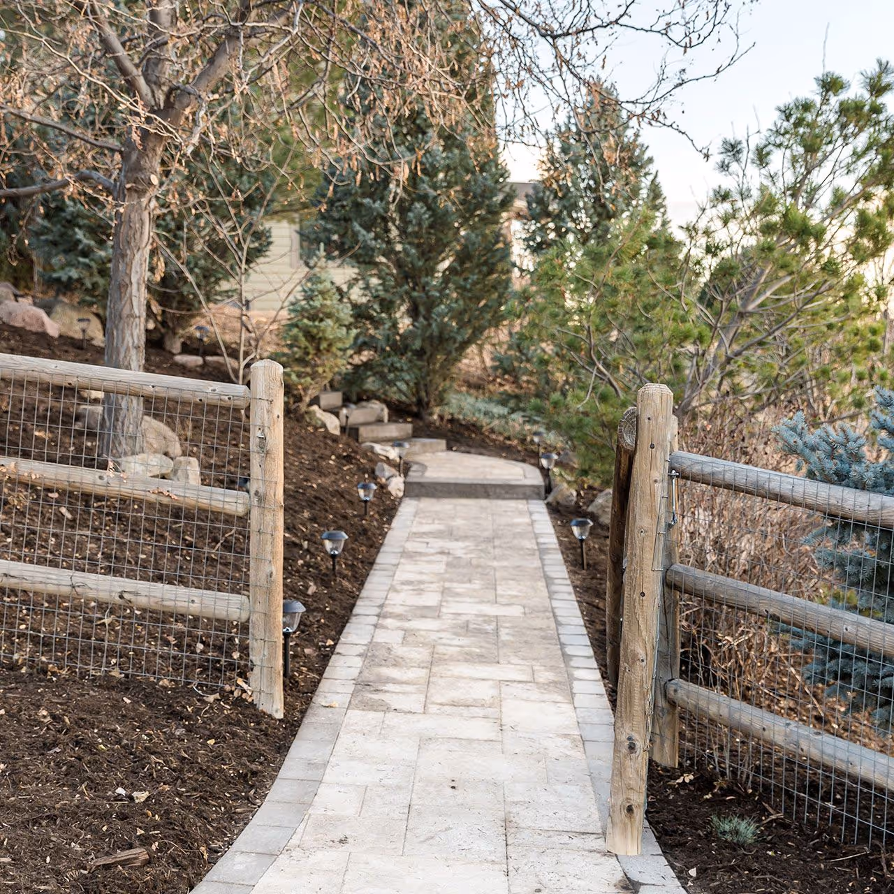 Decorative mulch and plant bed landscaping by Front Range Outdoor Solutions near me Windsor CO