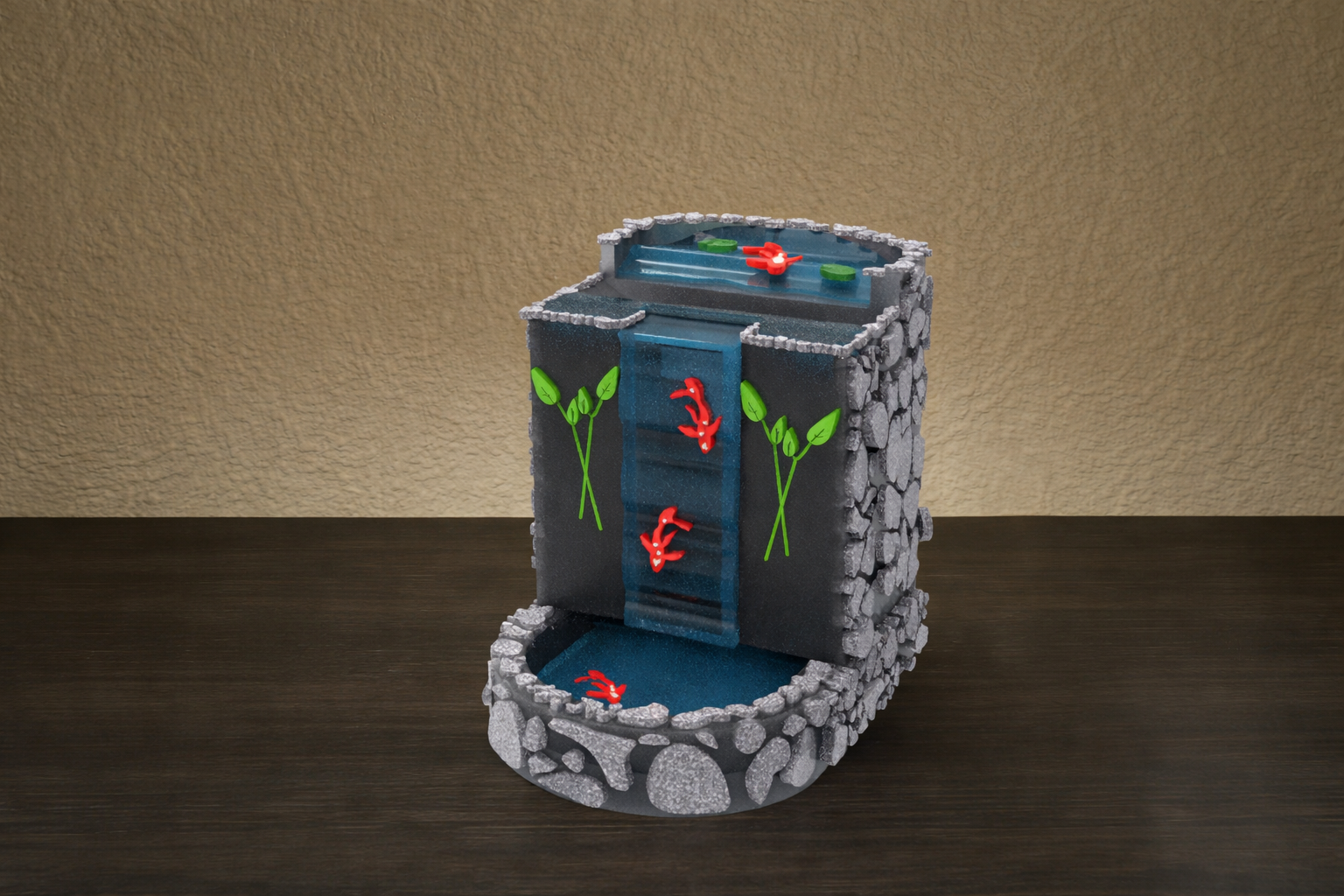 A custom dice tower that looks like a waterfall with Koi fish.