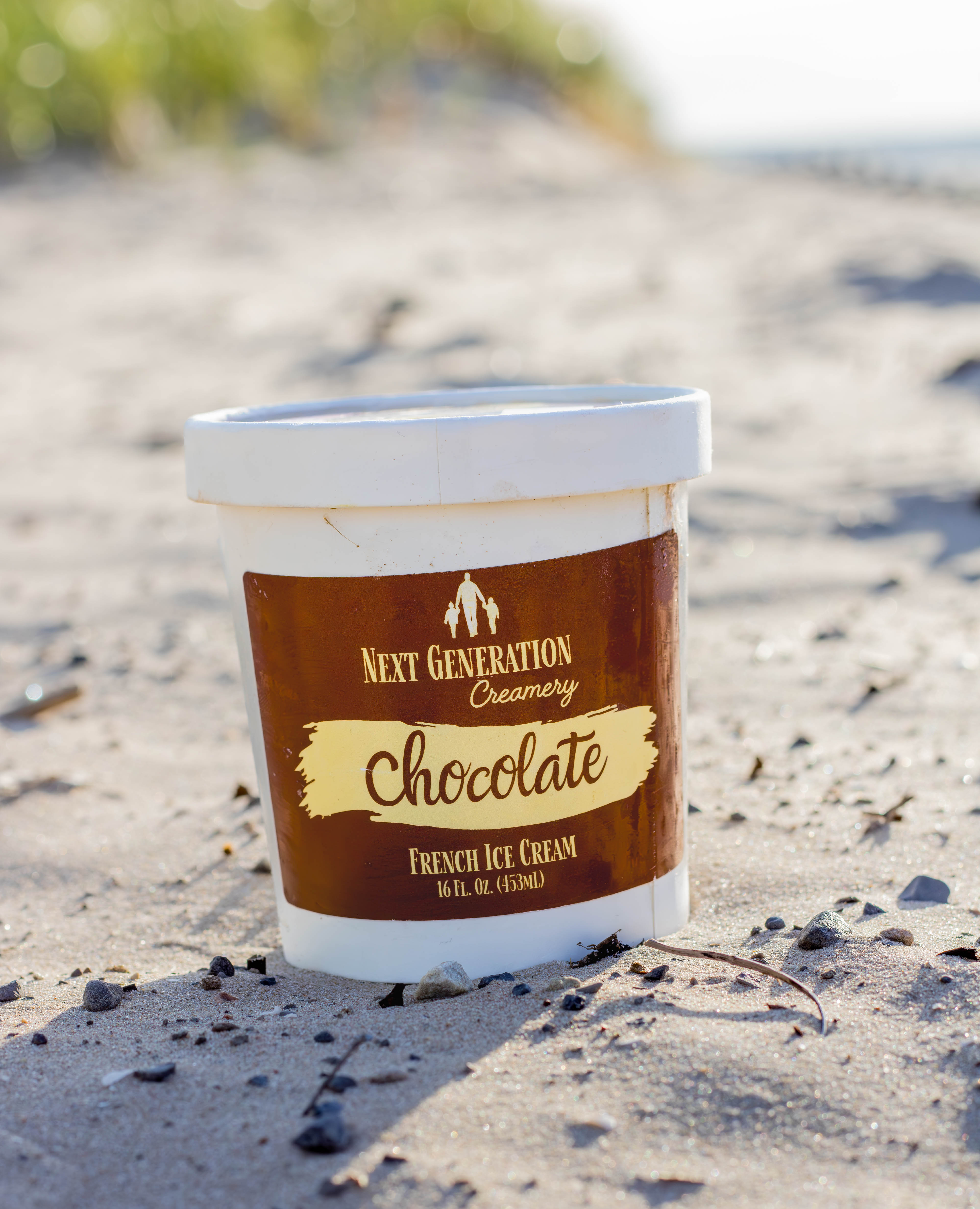 Next Generation Creamery French Ice Cream pint on beach