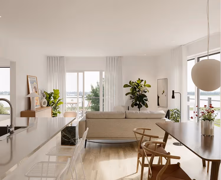 Open kitchen with living room, dining area and river view