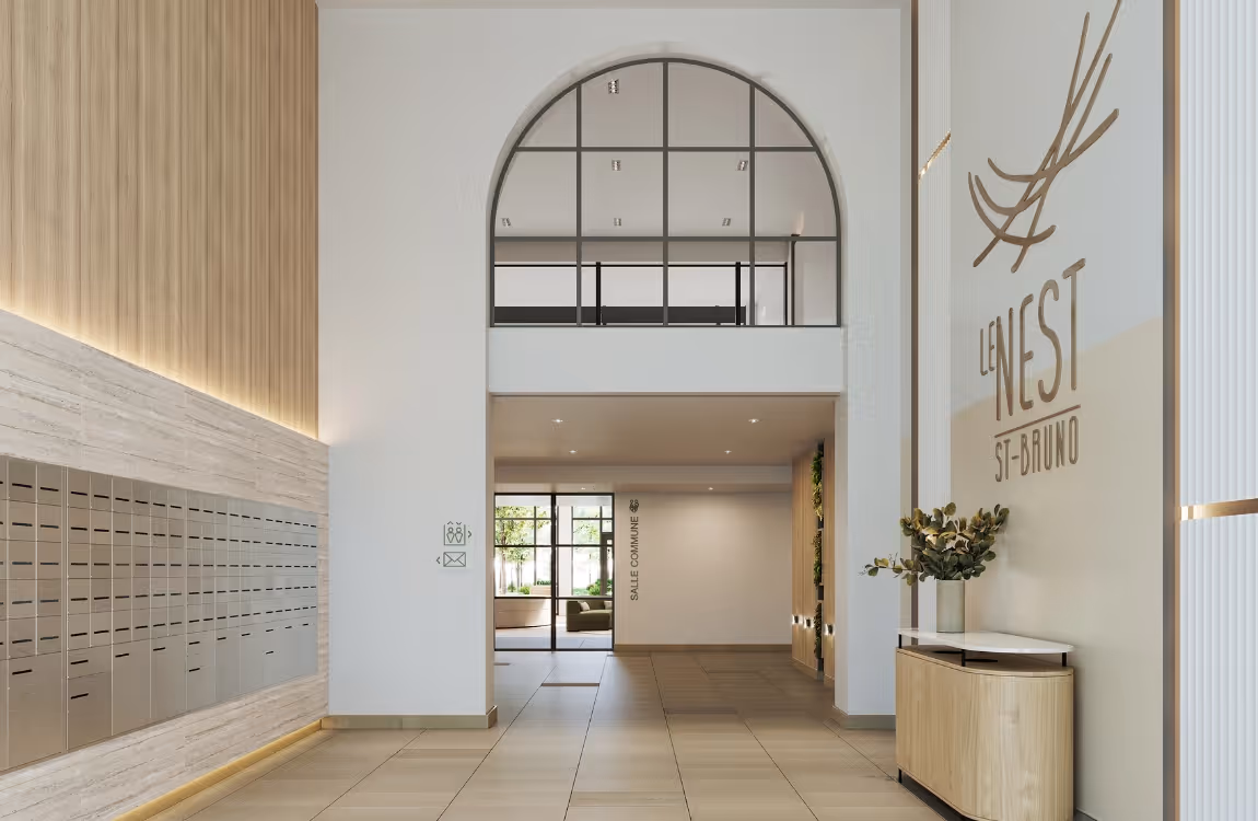 Hall d'entrée moderne avec boîtes aux lettres et accueil du projet résidentiel Le Nest immobilier à Saint-Bruno.