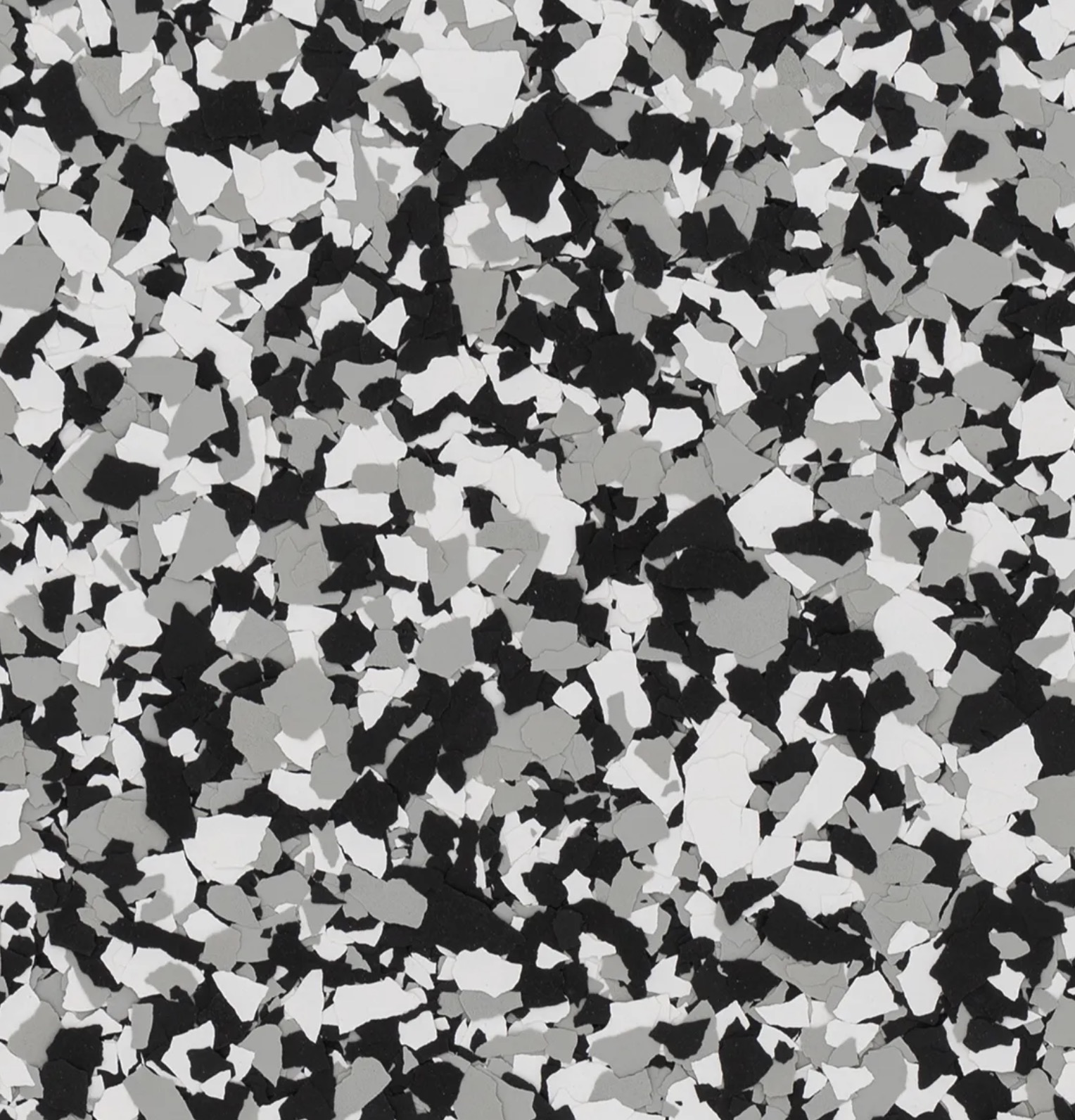 Modern patio with gray sectional sofa, square fire pit, lavender bushes, and a large tree in front of a contemporary house with mountain views in the background.