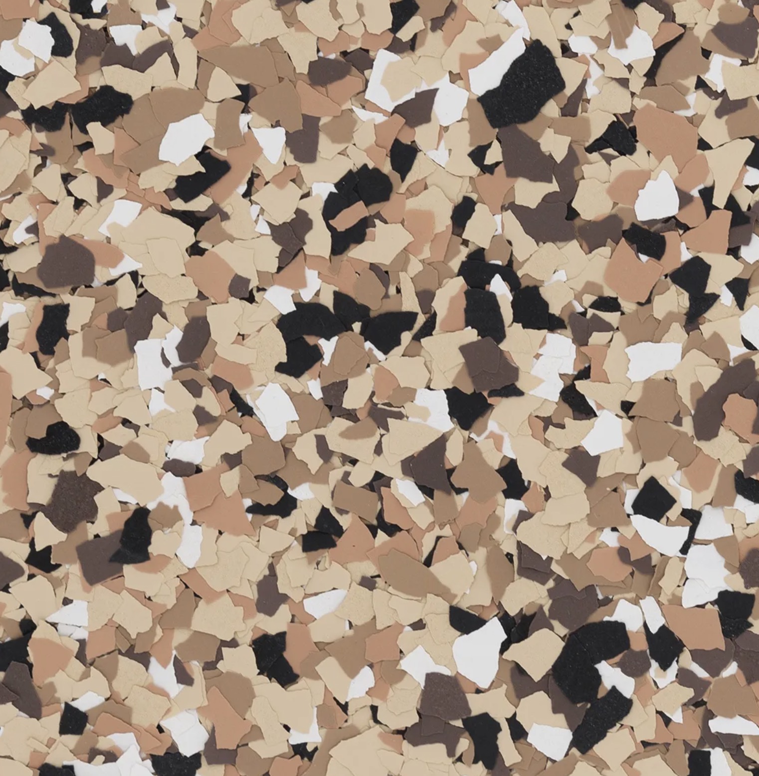 Workshop with tools on pegboard, workbench, metal tool chest, and air compressors on concrete floor.