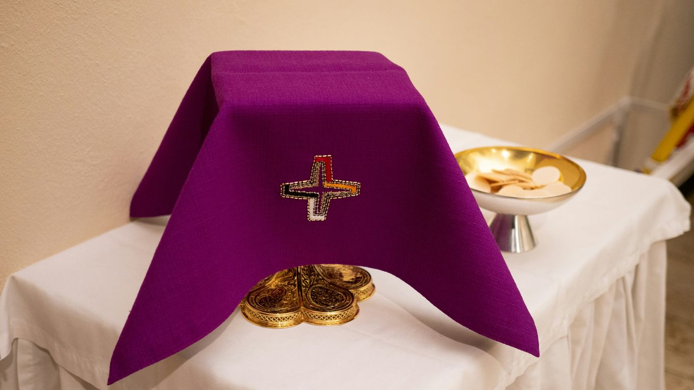 purple holy communion on table