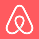 Airbnb logo featuring a stylized A-shaped symbol in white on a coral background.