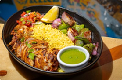 Curry Up Now 550 Bowl, 550 calories: tandoori chicken with turmeric rice, grilled bell peppers, pico and cilantro chutney