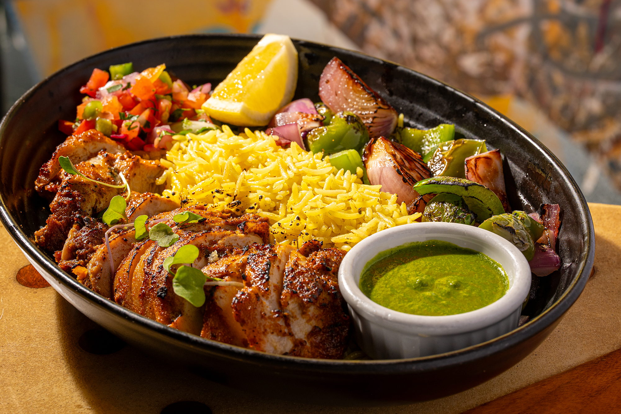 Curry Up Now 550 Bowl, 550 calories: tandoori chicken with turmeric rice, grilled bell peppers, pico and cilantro chutney