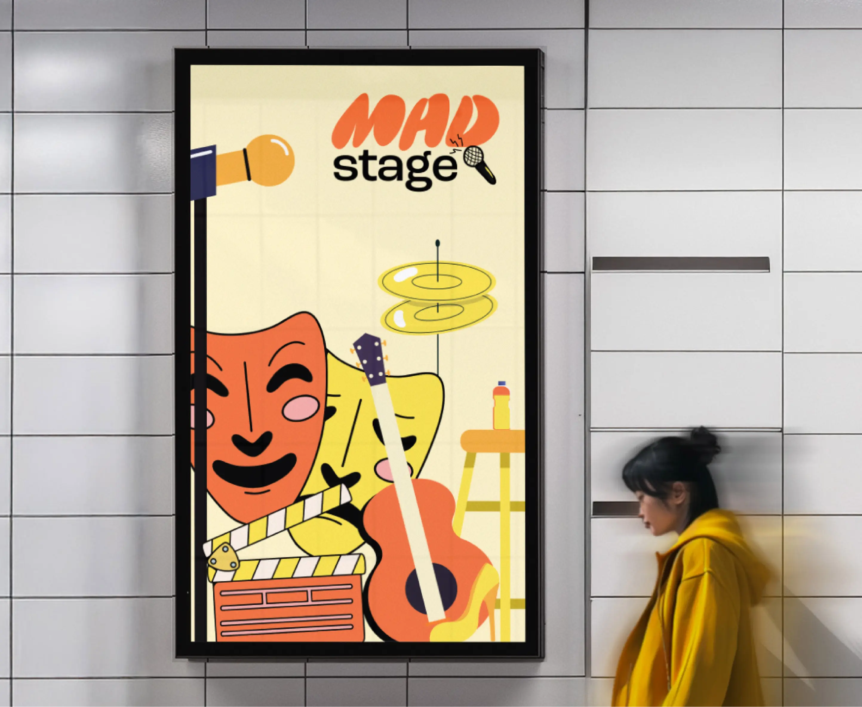 Poster on tiled wall showing theatrical masks, guitar, cymbals, clapperboard, and microphone with text 'MAD stage', with a person in a yellow jacket walking nearby.