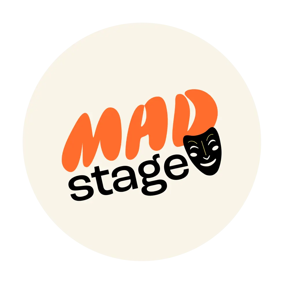 Logo with the words 'MAD stage' in orange and black, featuring a smiling theatrical mask integrated into the letter D.