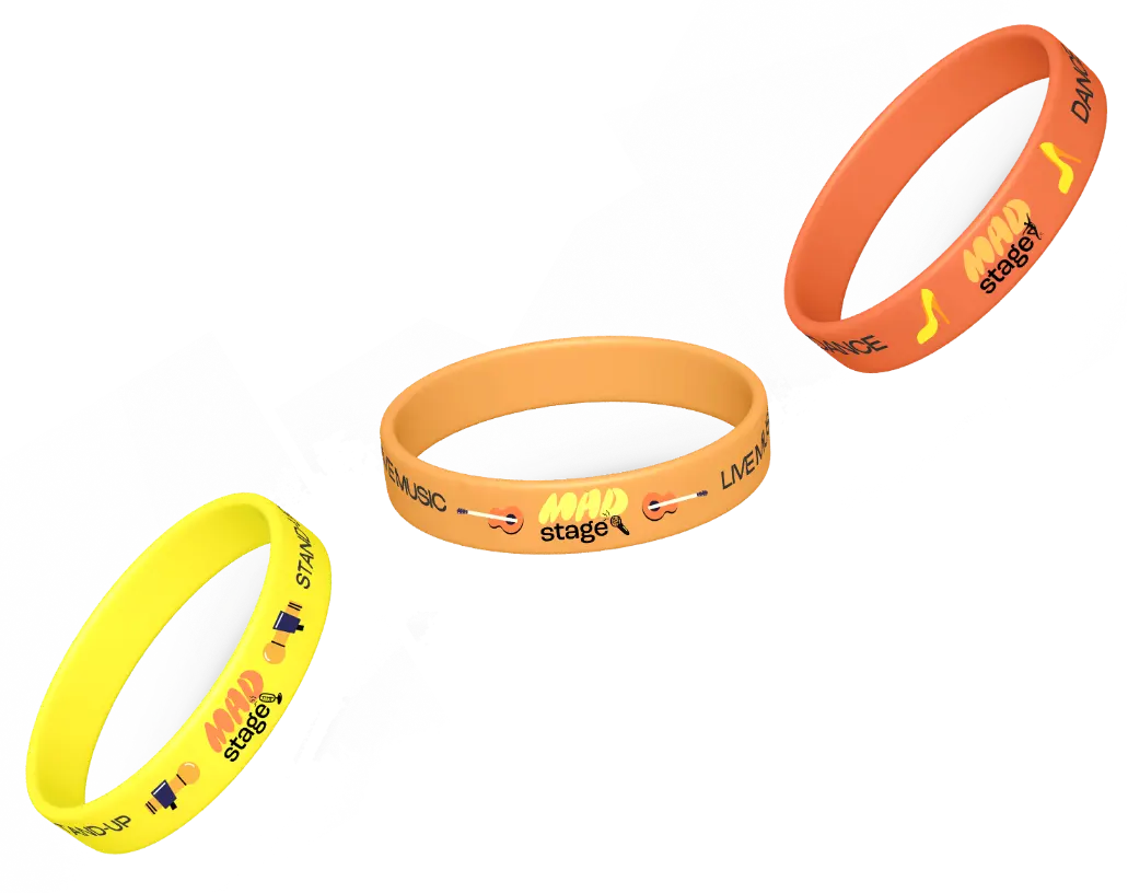 Three colorful silicone wristbands in yellow, orange, and red, each featuring the 'MAD stage' logo and music-themed icons.