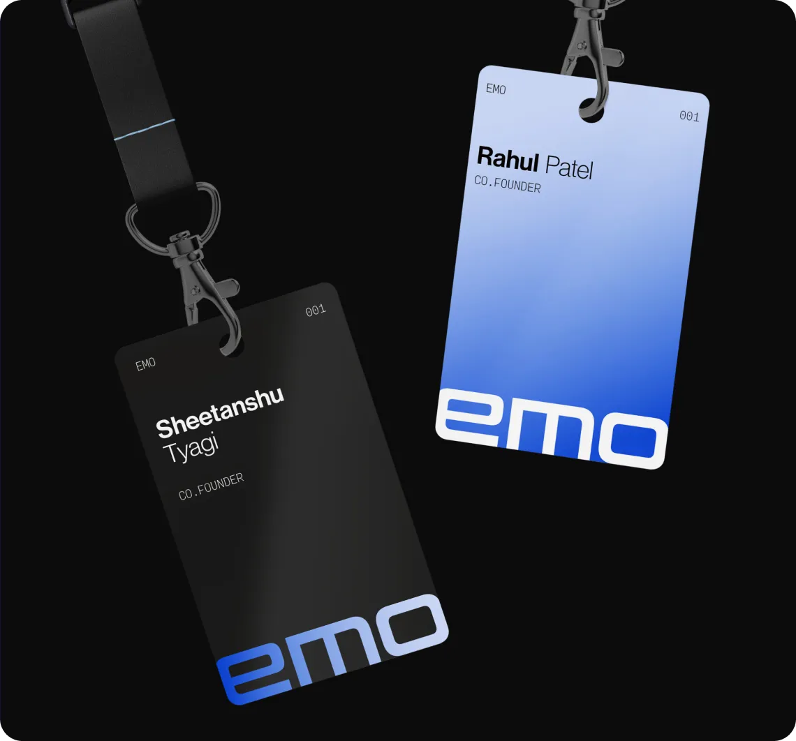 Two EMO company ID badges with lanyards, one black for Sheetanshu Tyagi and one blue for Rahul Patel, both labeled co-founder with the EMO logo at the bottom.