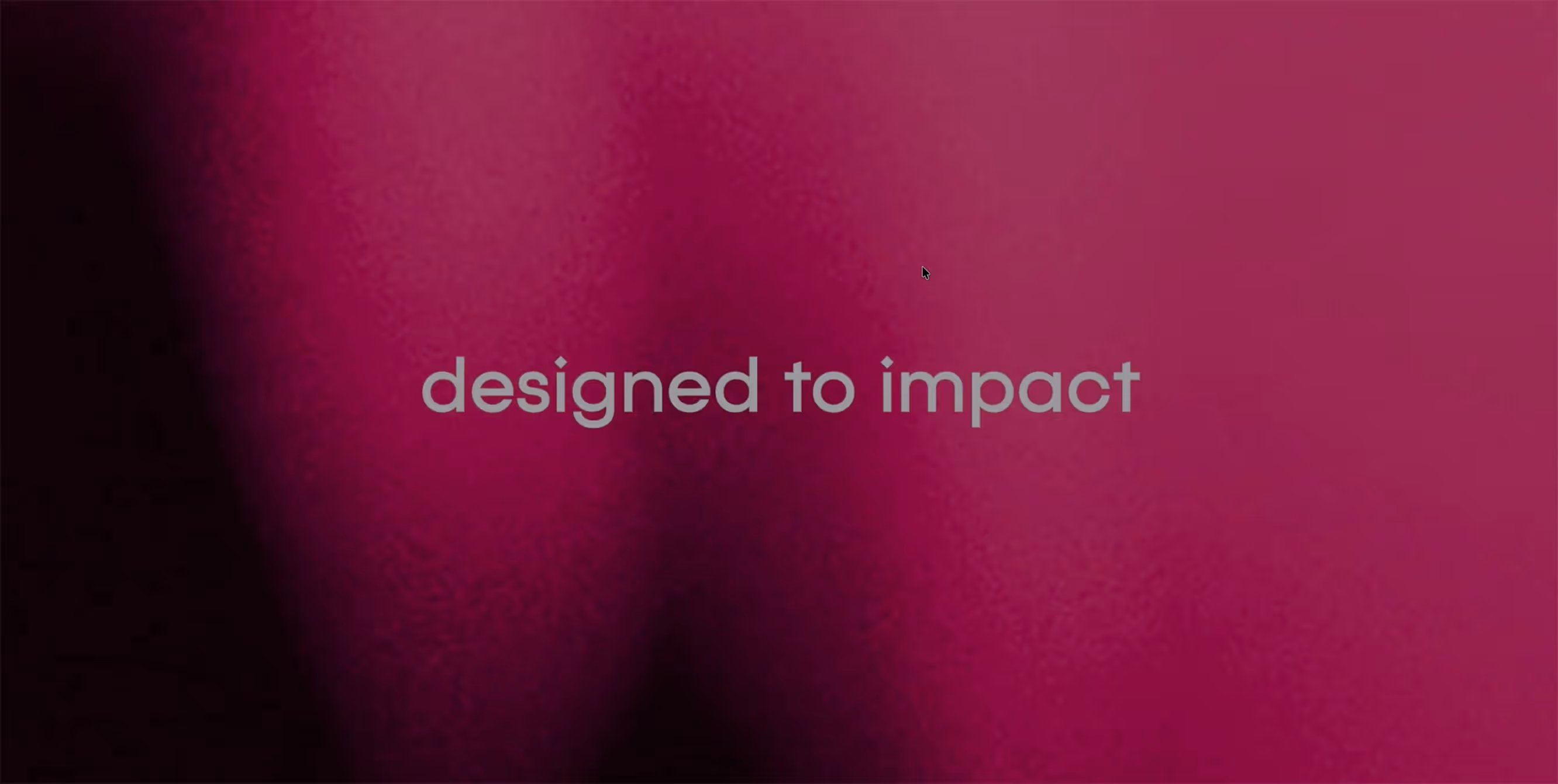 Text reading 'designed to impact' on a dark pink and black gradient background.