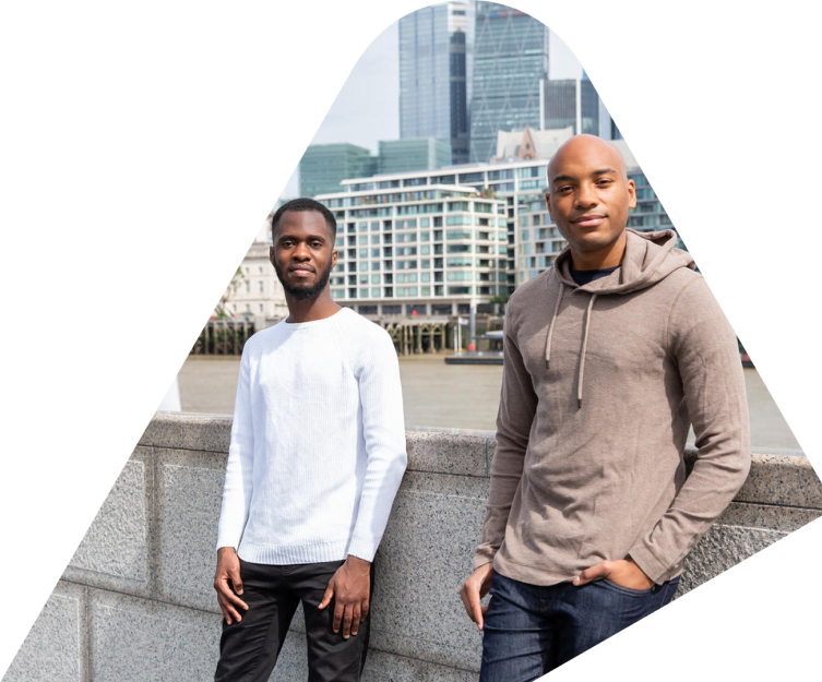 Co-founders Christian Facey and Wilfrid Obeng stand by the River Thames in London, UK