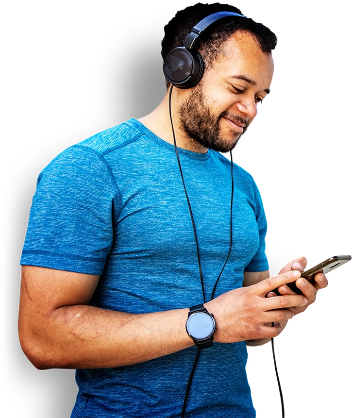 A man wearing headphones uses an app on his phone, listening to and Audiomob audio ad