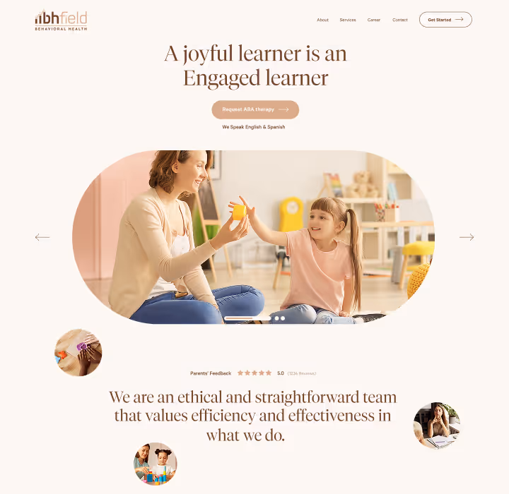 A therapist and a young girl playing together in a bright, colorful room with educational toys, smiling and engaging positively.