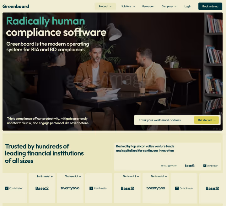 Website homepage of Greenboard showing a team meeting around a table with text promoting compliance software and logos of financial institutions and venture funds.