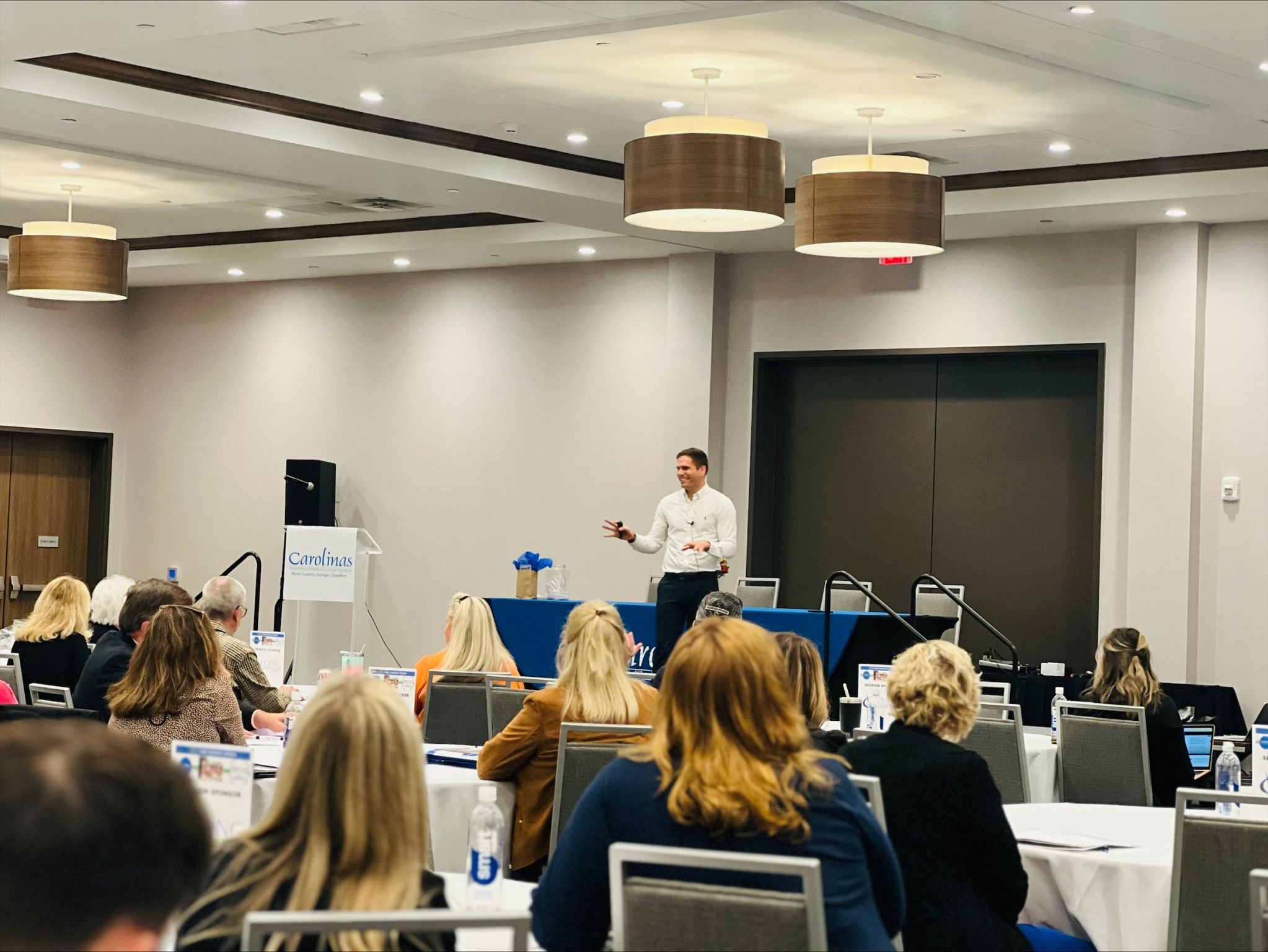 Zach Giglio speaking at a conference
