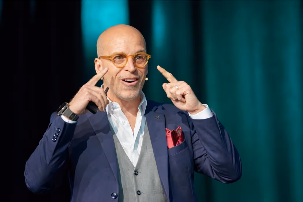 Martin Lesperance speaking on stage