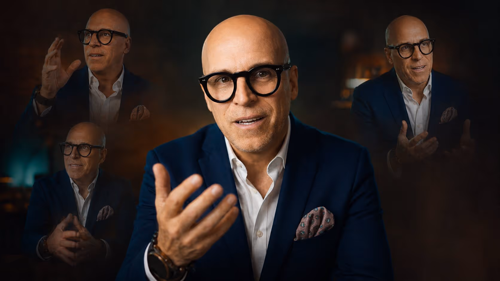 Bald man with glasses in a navy blazer and white shirt speaking with expressive hand gestures, shown in multiple blurred overlays.