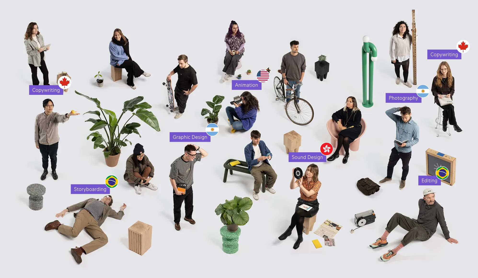 Diverse group of people with creative skills labeled by flags and professions like copywriting, animation, graphic design, sound design, photography, storyboarding, and editing.