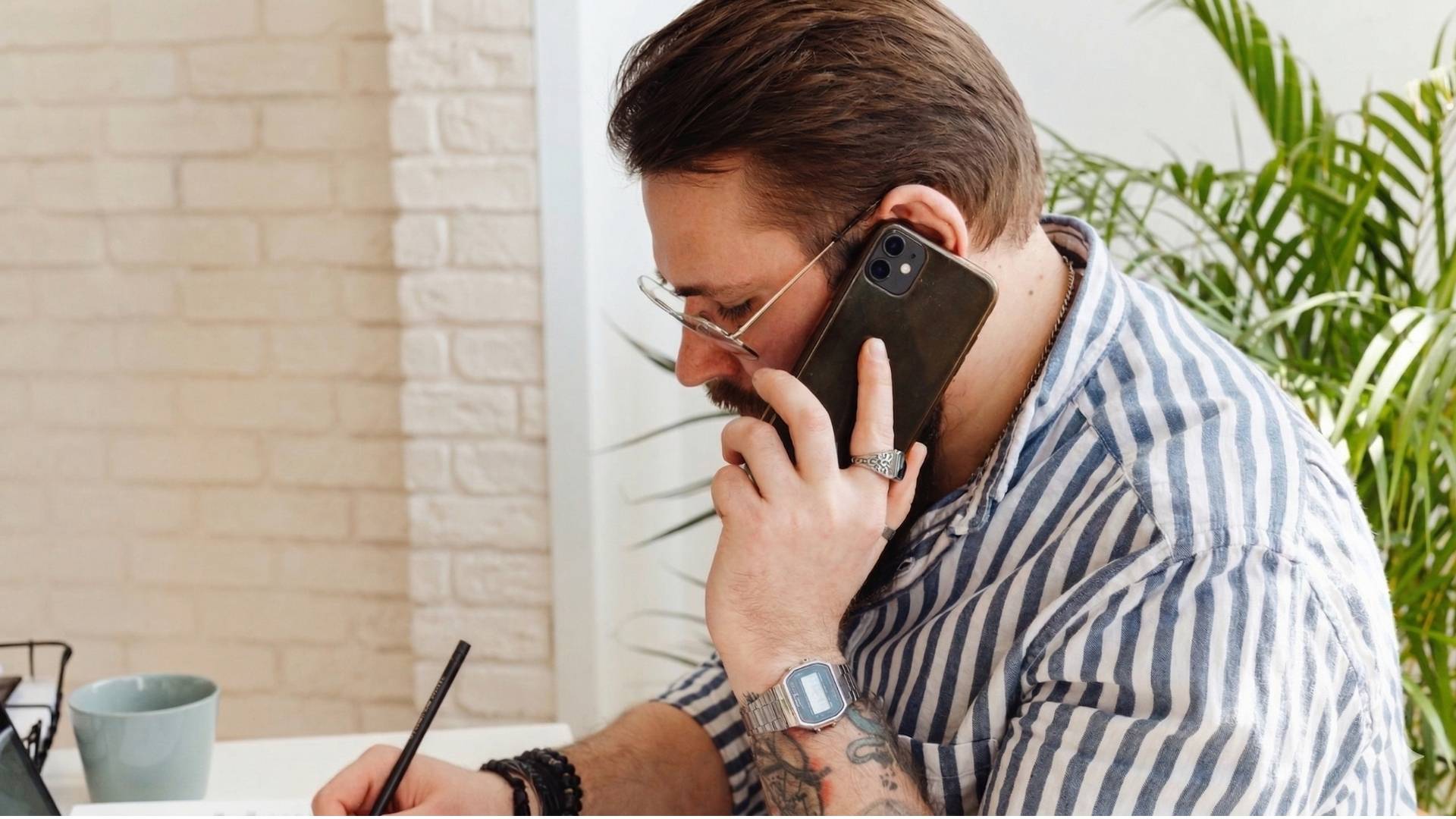 Person confident on call with clear information to hand