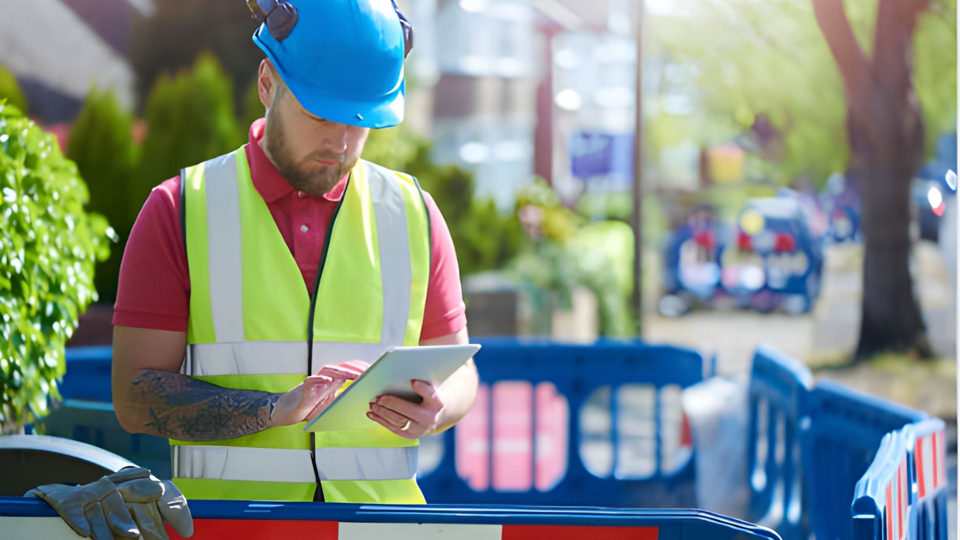 Worker on site reviewing compliance documentation with clarity and control