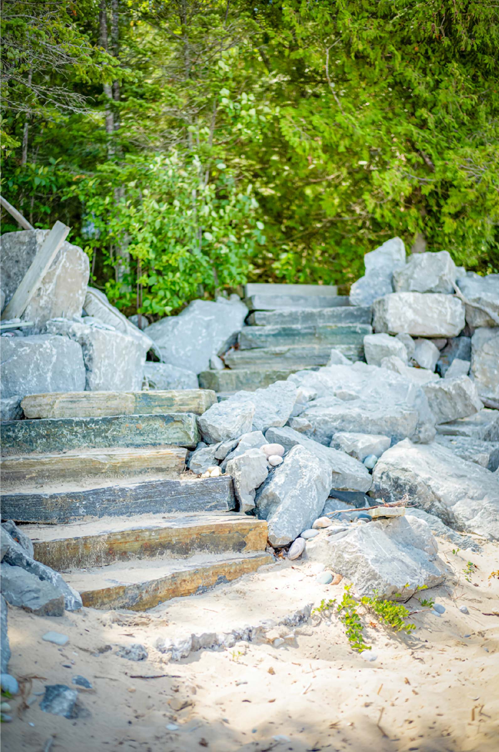 Jennifer Yaple student interpretation: mossy stone steps ascend through lush green foliage at Tusen Takk