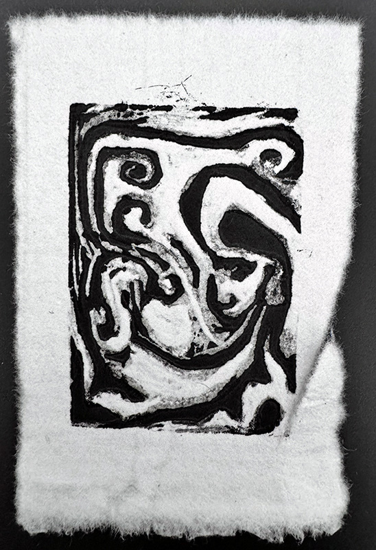 Initial failed linocut attempt for Blowing Smoke.