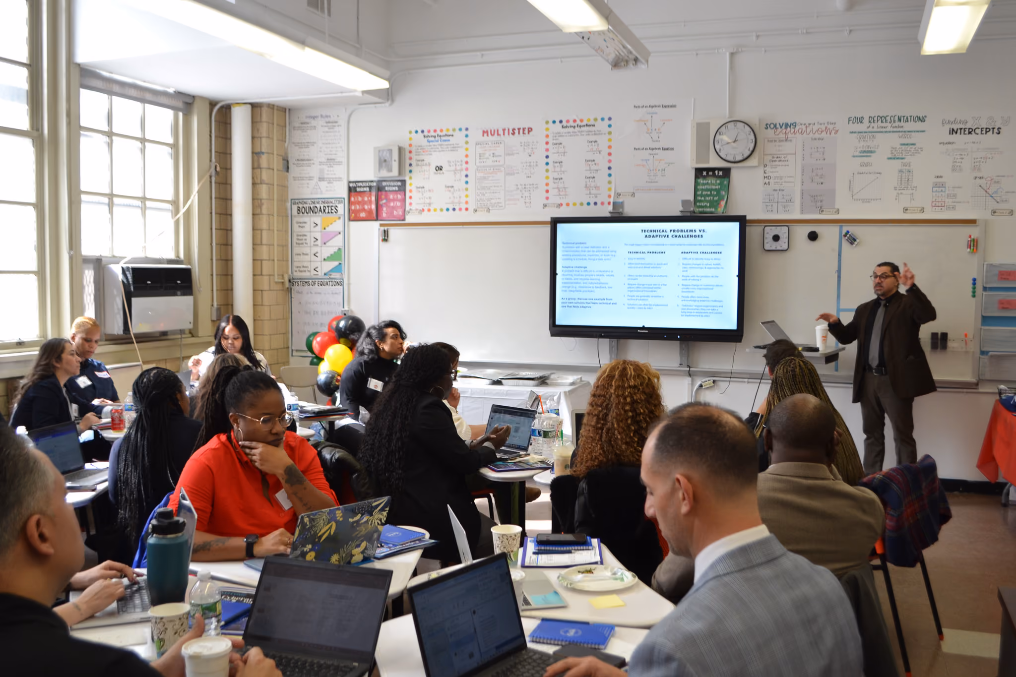 Educator presenting to teachers during a professional development session