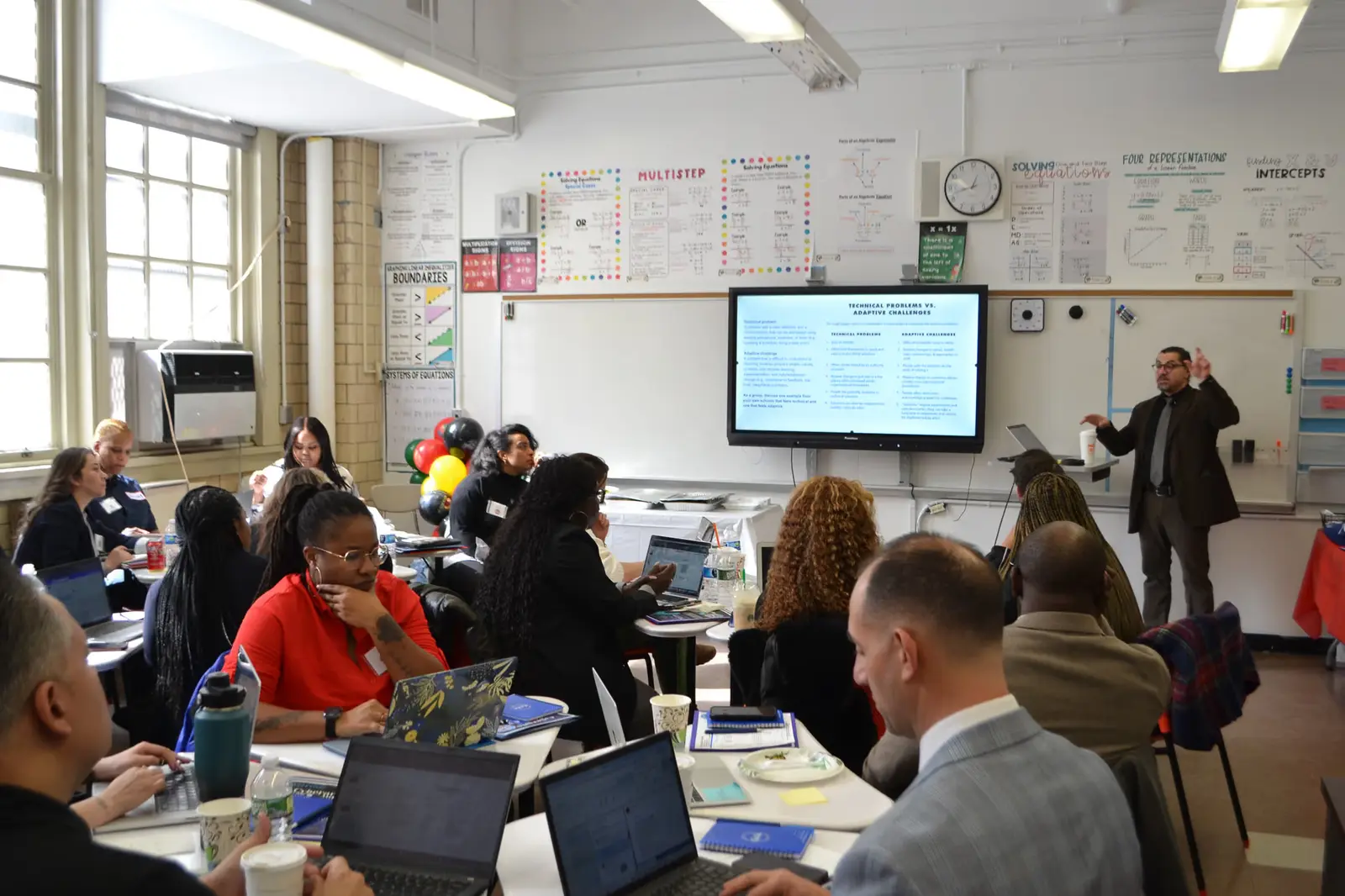 Educator presenting to teachers during a professional development session