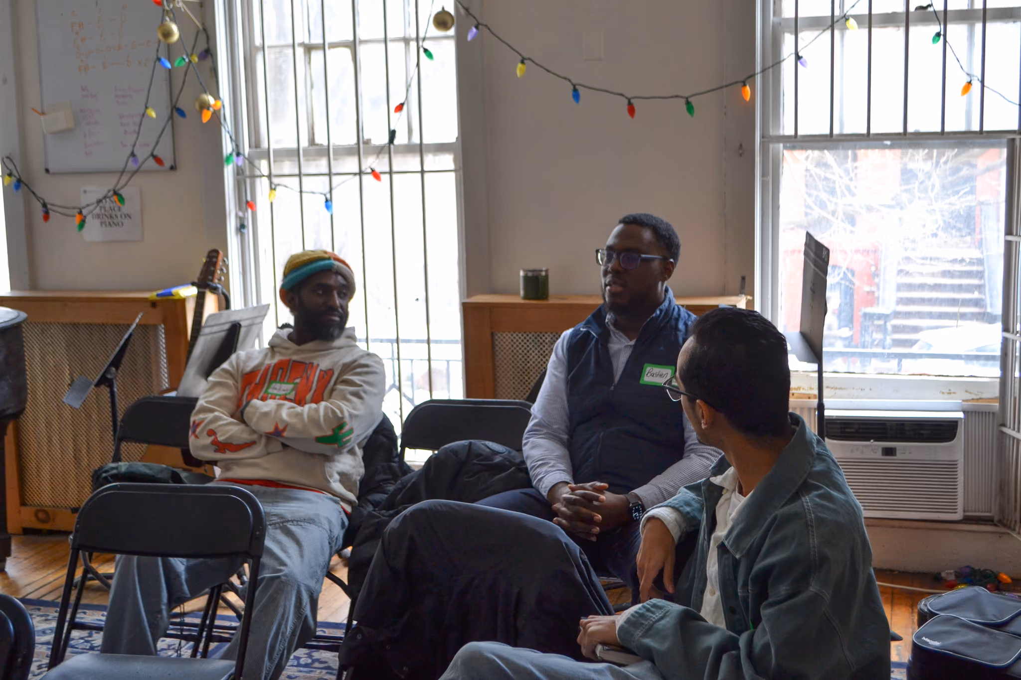 Three students in discussion during a classroom community circle