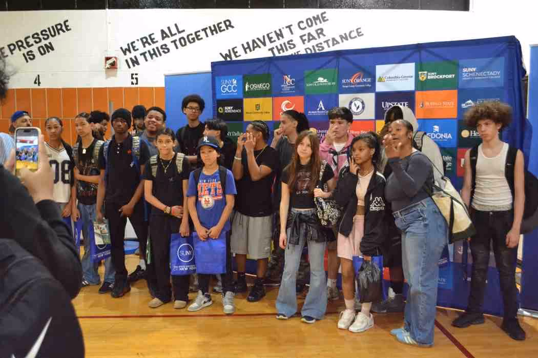 Students posing for group photo at SUNY college fair event