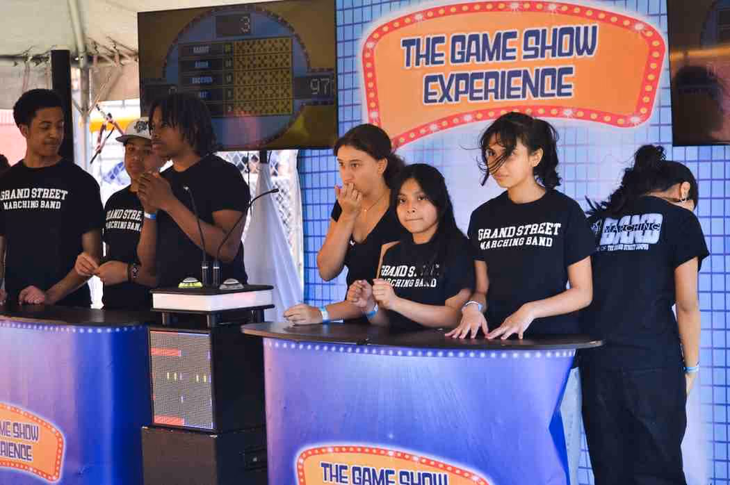 Grand Street Marching Band students competing at The Game Show Experience