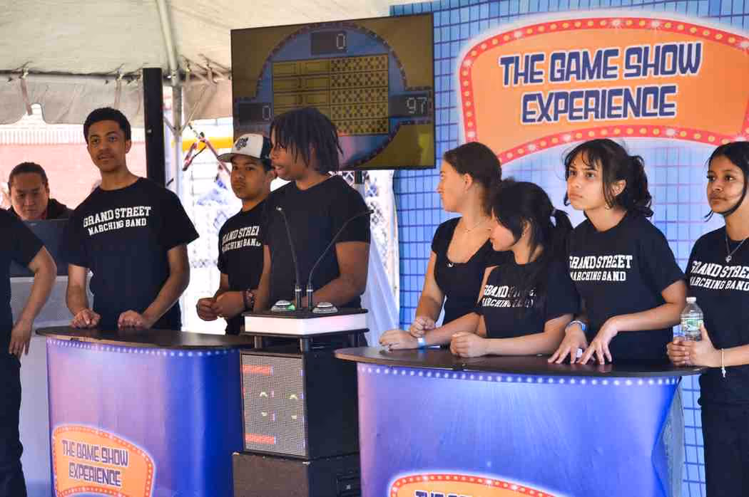 Grand Street Marching Band students competing at The Game Show Experience