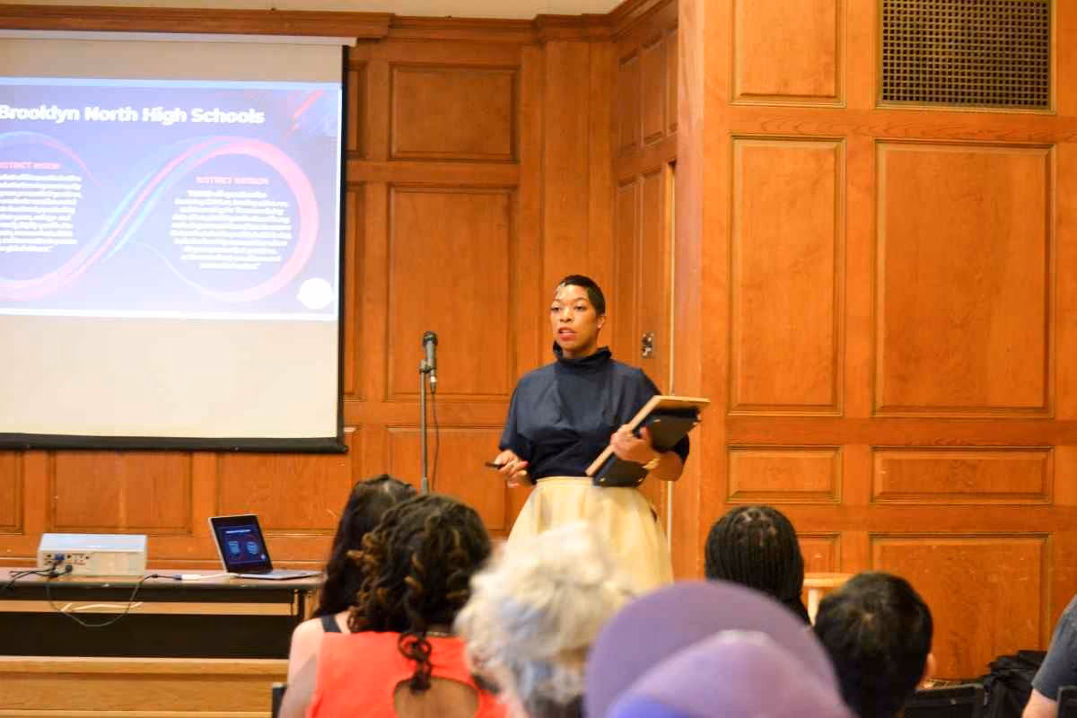 Presenter speaking at Brooklyn North High Schools district meeting