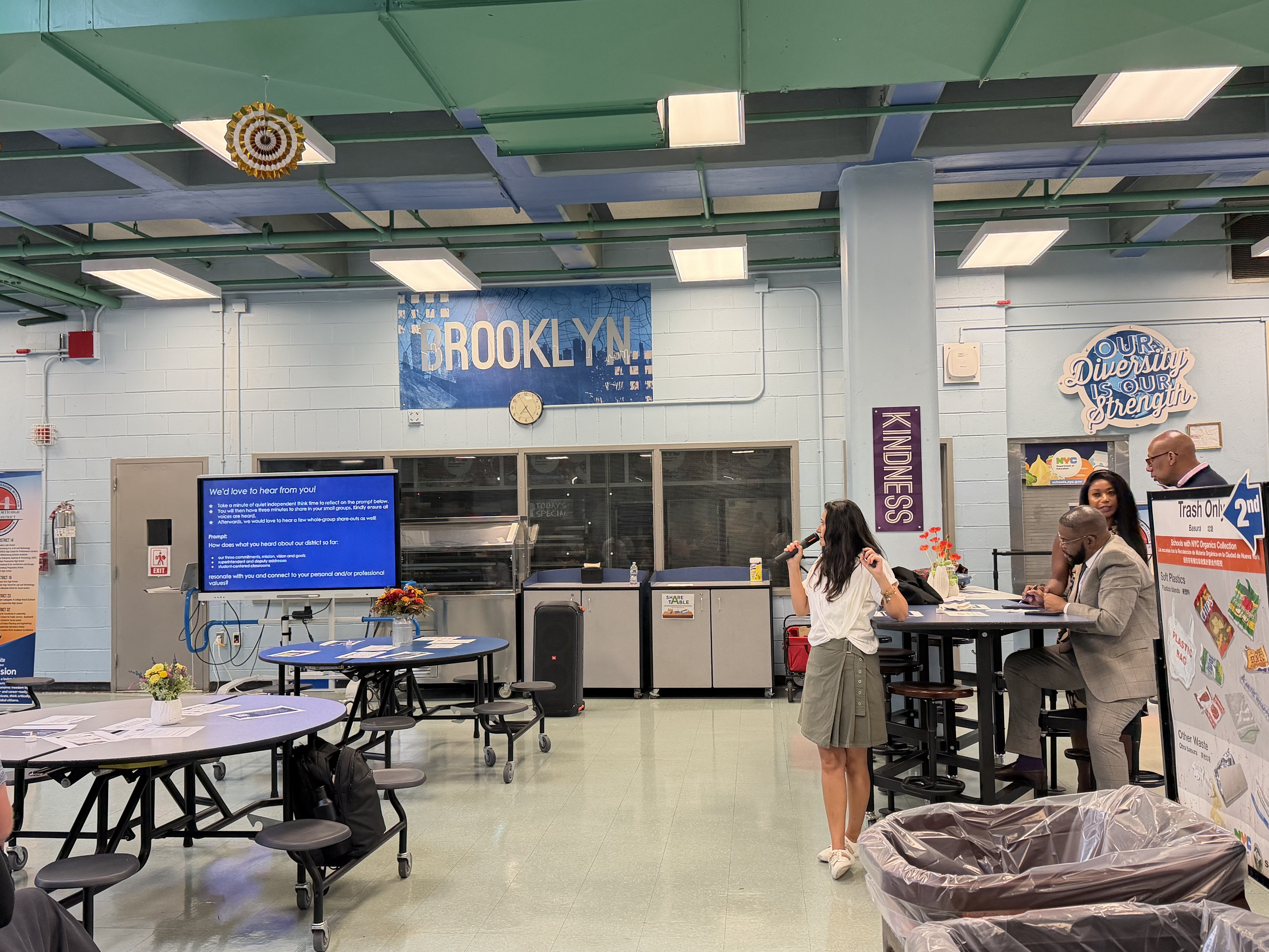 Presenter speaking at a Brooklyn school district community meeting