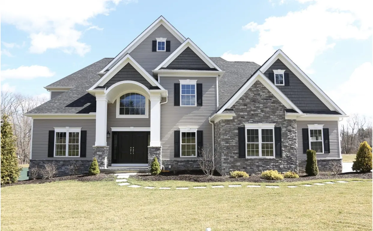 stone siding on home with front walkway