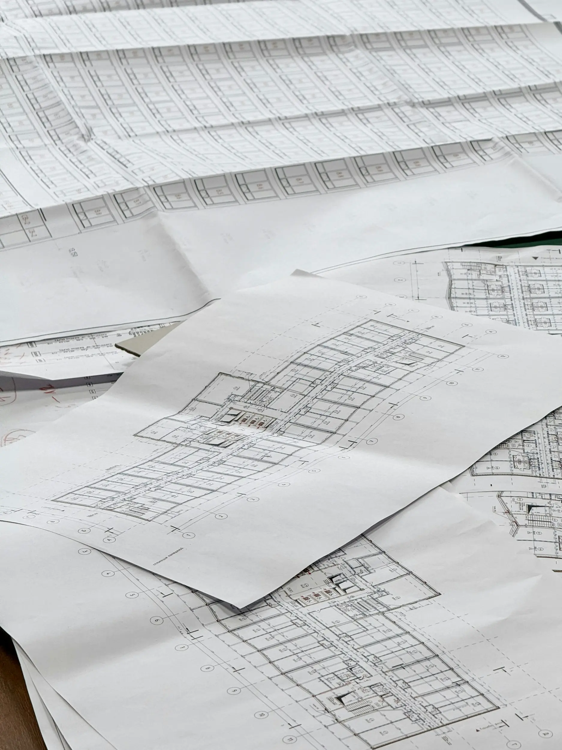 papers and documents spread across a table