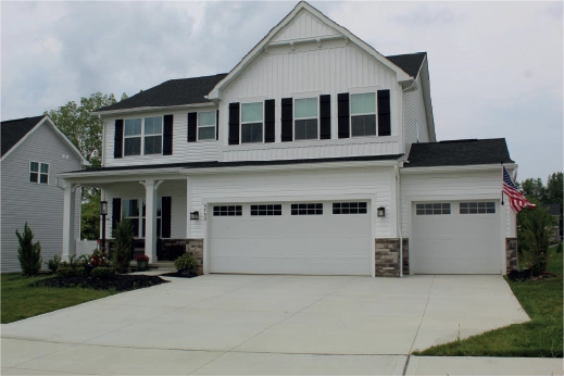 home with white and stone siding