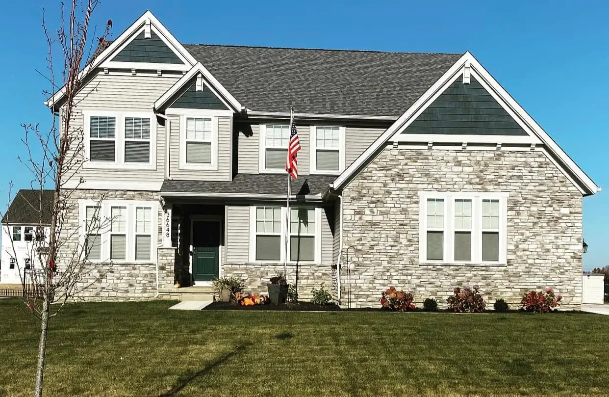 home with light stone siding