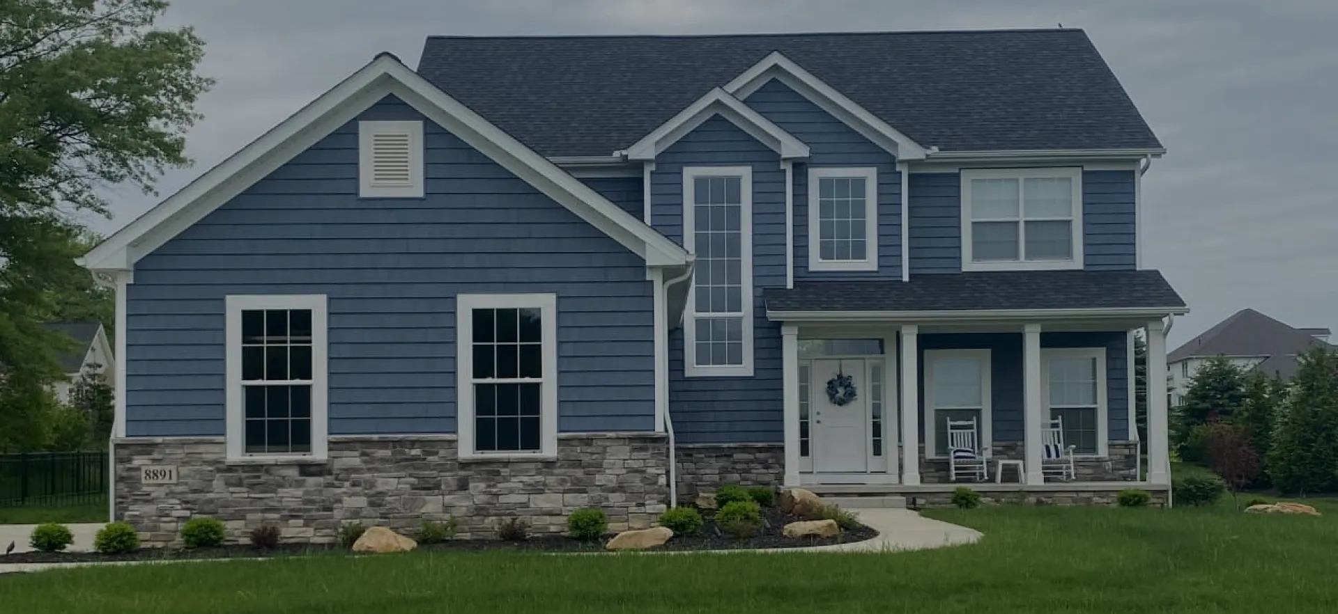 moonlight gray blue siding home